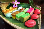 Traditional local market steamed or deep fried pastries: kuih lapis, kuih ubi, onde-onde .....