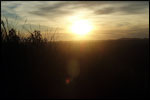 Be mesmerized with sunset watching on top of a hill overlooking oil palm plantation.