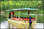 All aboard for a river boat ride in the tranquil lake and watch the fish hop around for food along the journey.